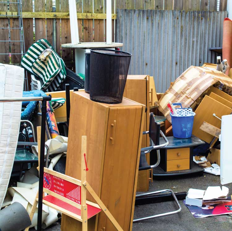  miscellaneous debris and unwanted items from a recent move-out.